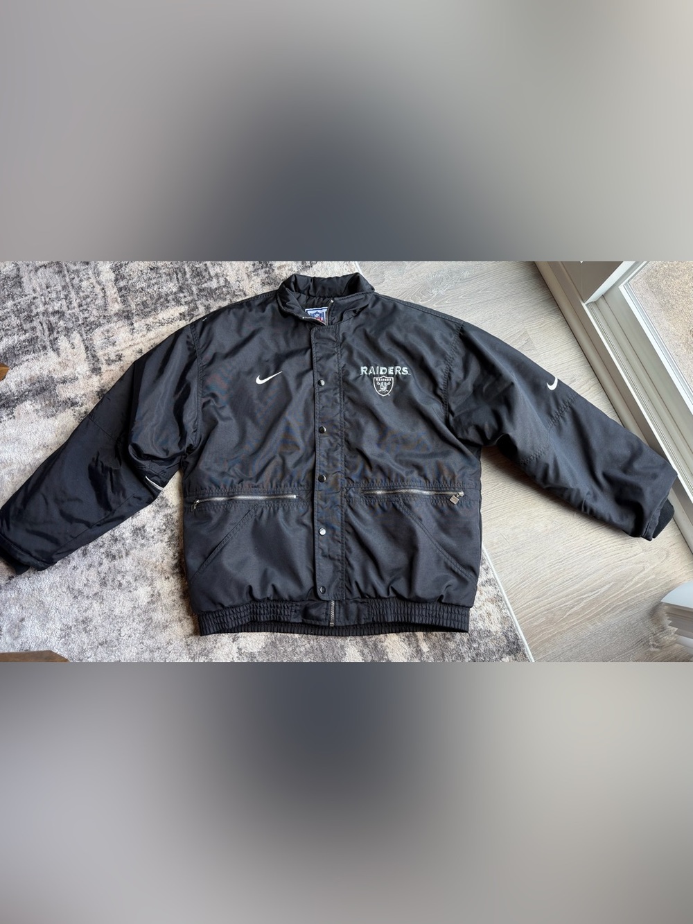Vintage 1990s Nike Pro Line Oakland Raiders black full-zip jacket size M